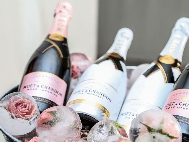 Bottles of Rosé over rose ice balls.