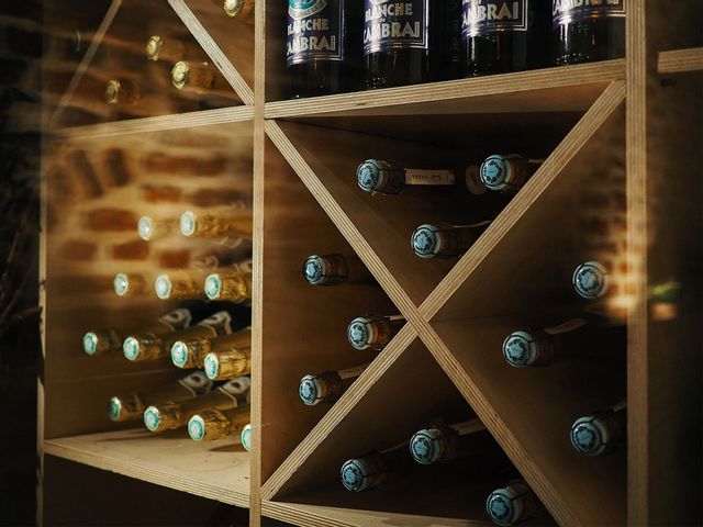 Champagne stacked in a cellar door.